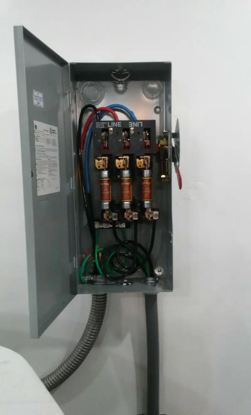 Three-phase disconnect switch installed for Smoke Detector Installation in Rockingham